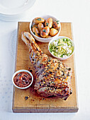 Greek leg of lamb with herbs and garnish