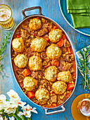 Lamb stew with rosemary cheddar dumplings