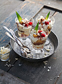 Layered dessert with pineapple and raspberries 'Tropical'