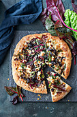 Chard pizza with feta and olives