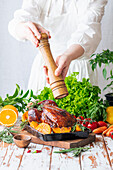 Glazed orange chicken with fresh herbs and vegetables