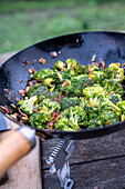 Wok-frying broccoli