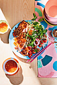Asian salad with fried chicken and chilli dressing