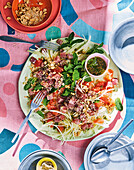 Tuna salad with fresh herbs, sprouts and nuts