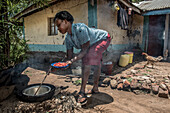 Women cooking, Kenya