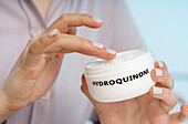 Hydroquinone medical cream, conceptual image