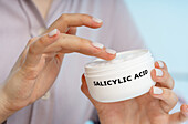 Salicylic acid medical cream, conceptual image