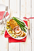 Fricandeau roll roast with honey-mustard crust and potatoes