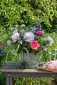 Bouquet of woolly cistus, peonies, lupins, barley, fennel, clover