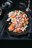 Cannellini bean and tomato salad with sumac dressing