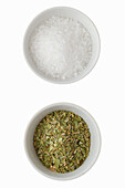 Sea salt and dry oregano in a bowl