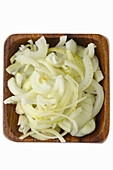 Top view of chopped onion in a bowl