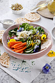 Spring vegetable salad with rice bread