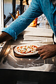 Pizza chef topping Pizza Margherita