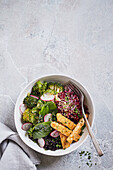 Black rice with marinated beetroot, sesame broccoli and tempeh
