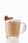 Hot milk winter drink with cinnamon and anise