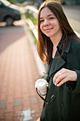 Teenage girl smiling at camera