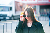 Teenage girl wearing sunglasses