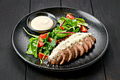 Angus beef steak with parmesan and salad