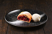 Cherry strudel with vanilla ice cream