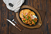 Potato pancakes with chanterelles and ham