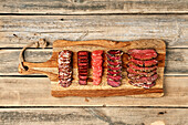 Various types of air-dried meat and sliced sausage