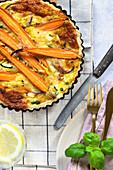 Vegetable quiche with courgettes, peppers and carrots