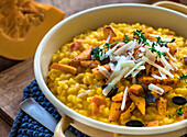 Pumpkin risotto with parmesan and herbs