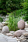 Stacked stones and ornamental grass in the Zen garden