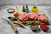 Raw lamb neck chops with rosemary and spices
