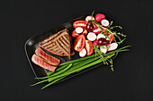 Grilled tri-tip beef steak with vegetables