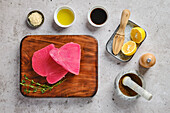 Raw tuna steaks with lemon and spices