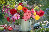 Summer bouquet of gladiolus (Gladiolus), oriental knotweed, dahlia (Dahlia), borage, joint flower (Physostegia virginiana) and fruit basket