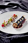 Rabbit cannelloni with wild mushrooms and vegetable garnish