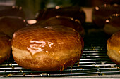Fresh doughnuts with sugar glaze