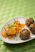 Chilli sesame balls with ginger carrots