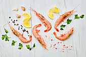 Raw prawns with lemon, pepper and parsley