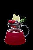 Hot apple and cranberry punch with rosemary