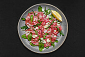 Beef carpaccio with rocket and parmesan