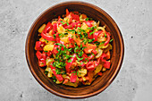 Vegetarian vegetable ragout with peppers and herbs