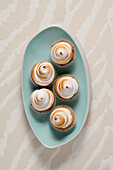 Passion fruit tartlets with meringue topping