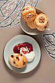 Scones with walnuts and sultanas, clotted cream and jam