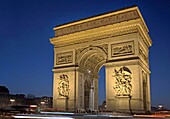 France, Paris, Arc de Triomphe and Place Charles de Gaulle Etoile illuminated at night
