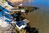 France, Charente-Maritime, Saintonge, Cote de Beaute, Gironde estuary, Meschers-sur-Gironde, cliffs and troglodyte dwellings (aerial view) (aerial view)