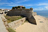 France, Corse du Sud, Ajaccio, watch turret and walls of the Citadel on the old town beach