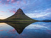 Iceland, Western Region, Grundafjordur, Kirkjufell reflection at sunset