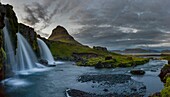 Iceland, Western Region, Grundafjordur, Kirkjufell and Kirkjufellsfoss falls at sunset