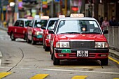 China, Hong Kong, typical red taxi in Hong Kong's Kowloon district