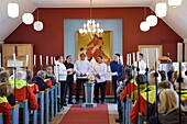 Greenland, North West coast, Qaanaaq or New Thule, Inuit choir in the church