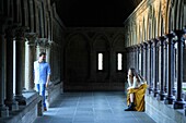 France, Manche, the Mont-Saint-Michel, couple in the cloister